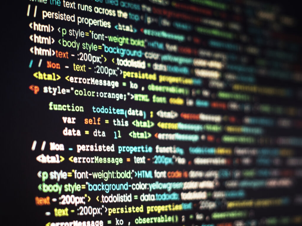 Computer program coding on screen (Designed by Freepik)