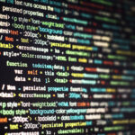 Computer program coding on screen (Designed by Freepik)